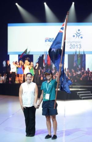 Kelsey Robson carries the flag