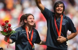 Messi and Romero celebrating