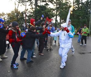 Toby Fender is carring the Olympic Torch