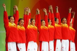 Team China celebrates their bronze medal