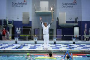 Olympic Torch Takes A Dip