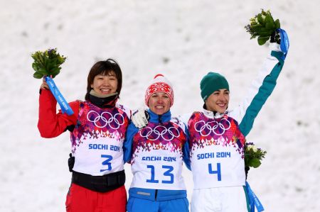Lassila on podium with medalists