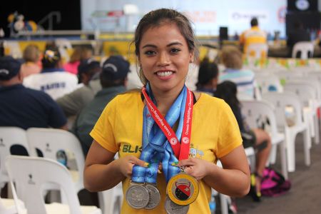 Barter with medals at 2015 Pacific Games.