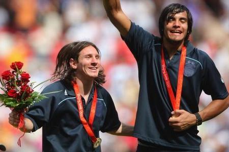 Messi and Romero celebrating