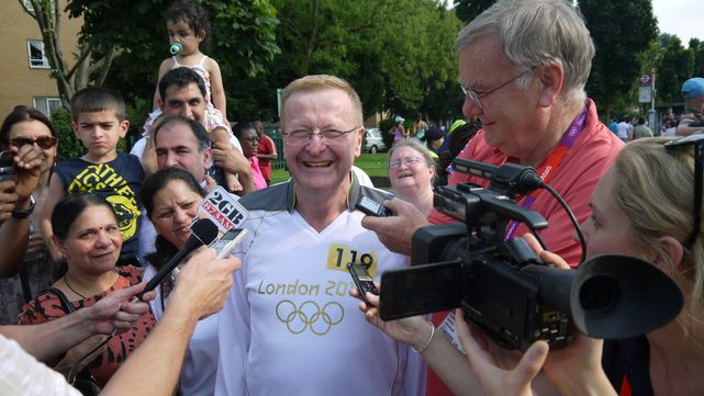 John Coates carries the Torch