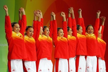 Team China celebrates their bronze medal