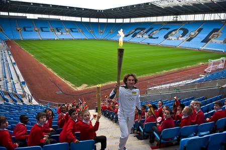 Olympic Torch Hits Olympic Football Venue