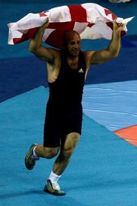 Revazi celebrates his gold medal
