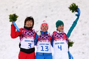 Lassila on podium with medalists