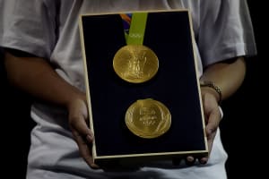 A close-up of the Olympic gold medal