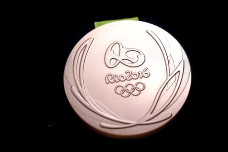 A close-up of the Olympic bronze medal