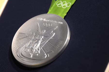 A close-up of the Olympic silver medal