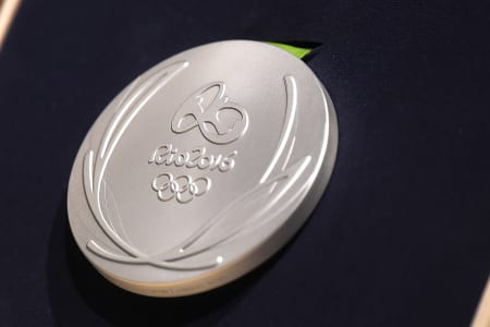 A close-up of the Olympic silver medal