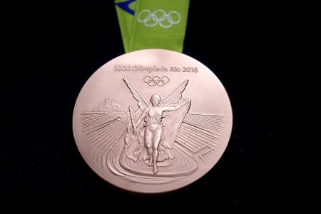 A close-up of the Olympic bronze medal