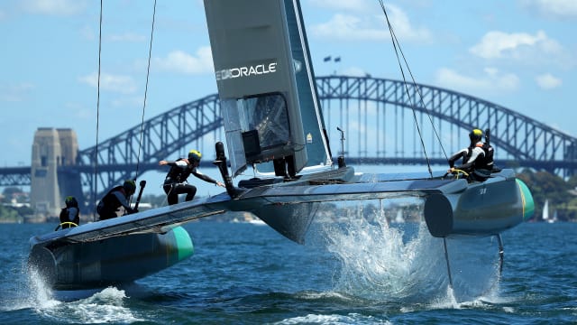 Olympians flying through Sydney Harbour at SailGP