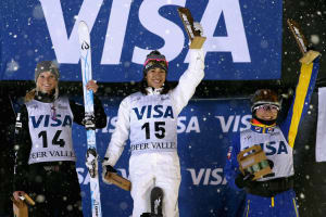 Kiley McKinnon #14, Lydia Lassila #15 of Australia and Mengtao Xu #2 of China celebrate on the medals podium after the Ladies Aerials during the FIS Freestyle World Cup at Deer Valley Resort on February 3, 2017 in Park City, Utah. 