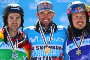 Bronze medalist Lucas Eguibar of Spain, gold medalist Pierre Vaultier of France and bronze medalist Alex Pullin of Australia pose during the medal ceremony for the Men's Snowboard Cross on day five of the FIS Freestyle Ski & Snowboard World Champions
