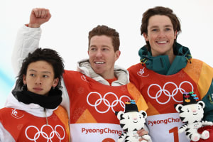 Silver medalist Ayumu Hirano of Japan, gold medalist Shaun White of the United States and bronze medalist Scotty James of Australia pose during the victory ceremony for the Snowboard Men's Halfpipe Final